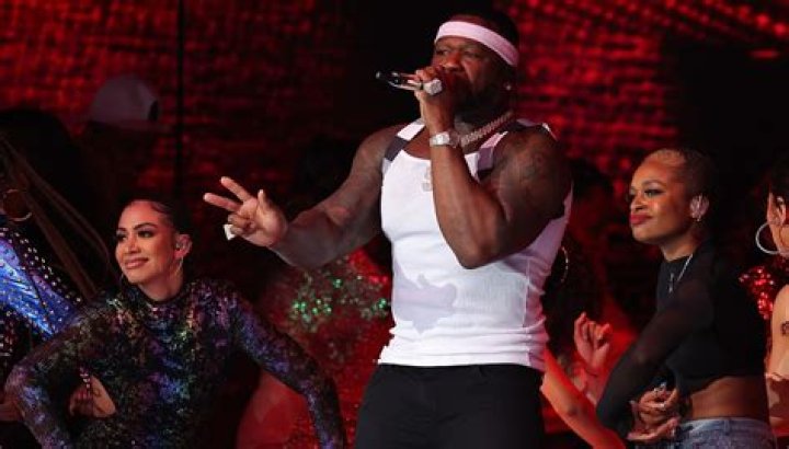 50 Cent makes surprise appearance in Super Bowl Halftime Show hanging upside down